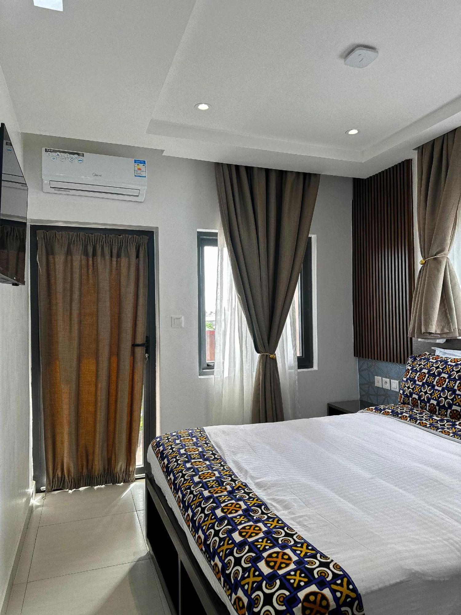 Klik Klak Appart Hotel Cotonou Exterior photo